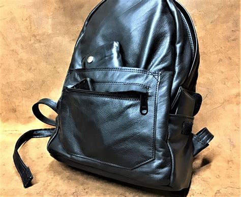 Genuine Leather Bags and Backpacks Made In Italy .